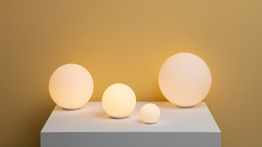 Artemide Dioscuri Table Lamp in a room setting