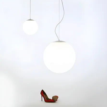 Pristine pearl-like spherical lighting fixture, adds a sophisticated touch to any interior design.