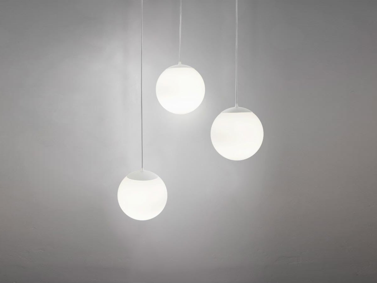 Innermost Drop glass globe pendant by Innermost – hung at different heights