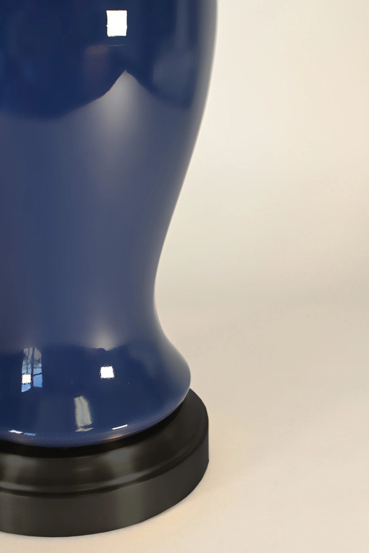 Midnight blue ceramic glaze and black metal base detail on Elijah cordless lamp
