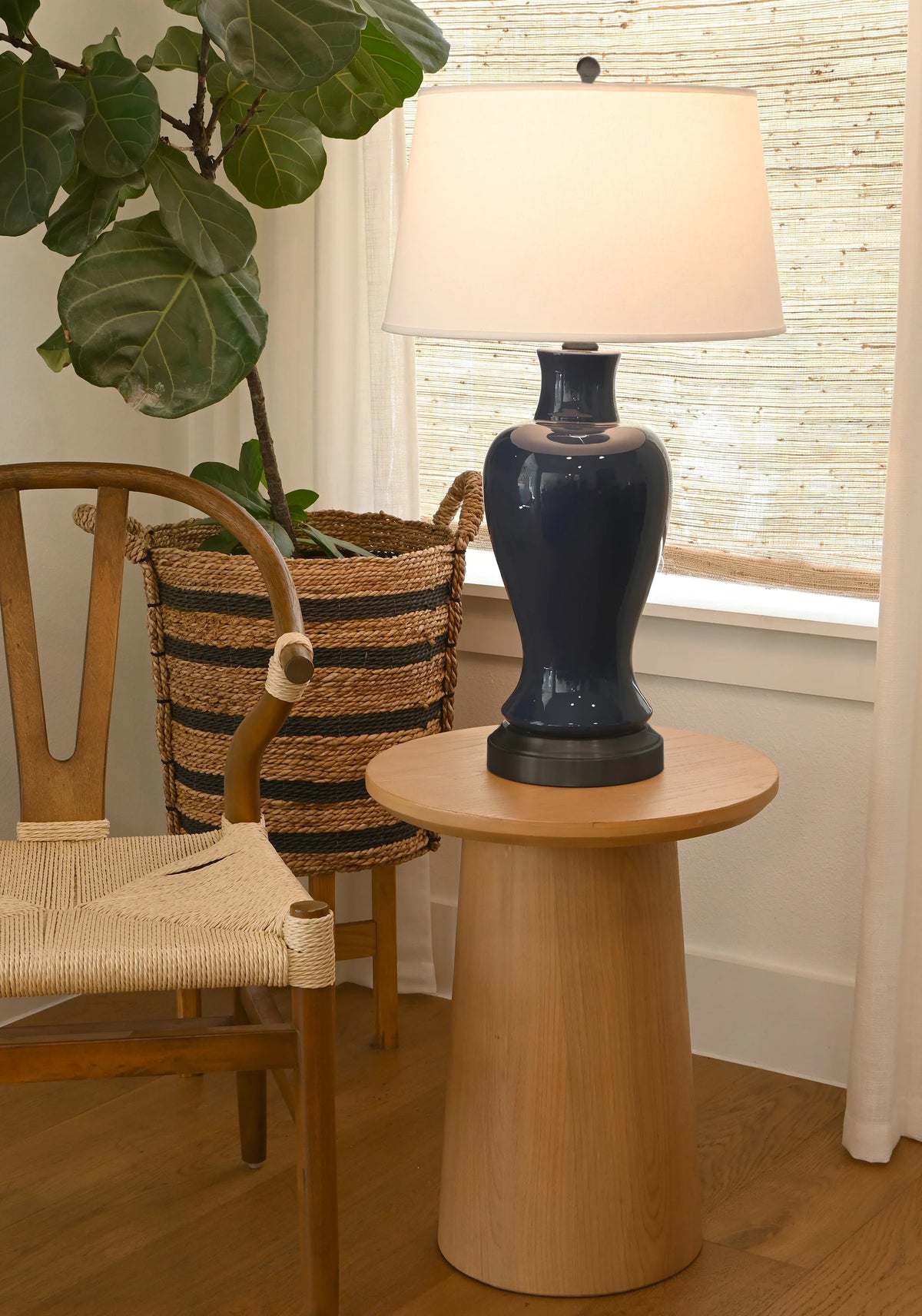Elijah rechargeable midnight blue ceramic table lamp with black accents and off-white shade