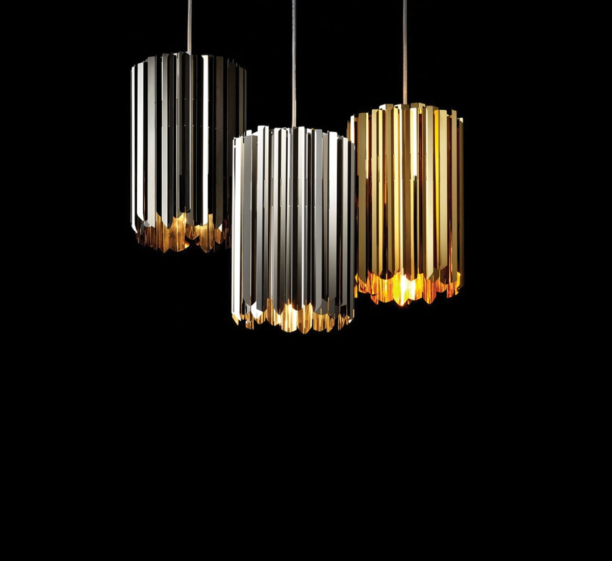 Innermost Facet 18 mini pendant light by Tom Kirk – a group lit at night