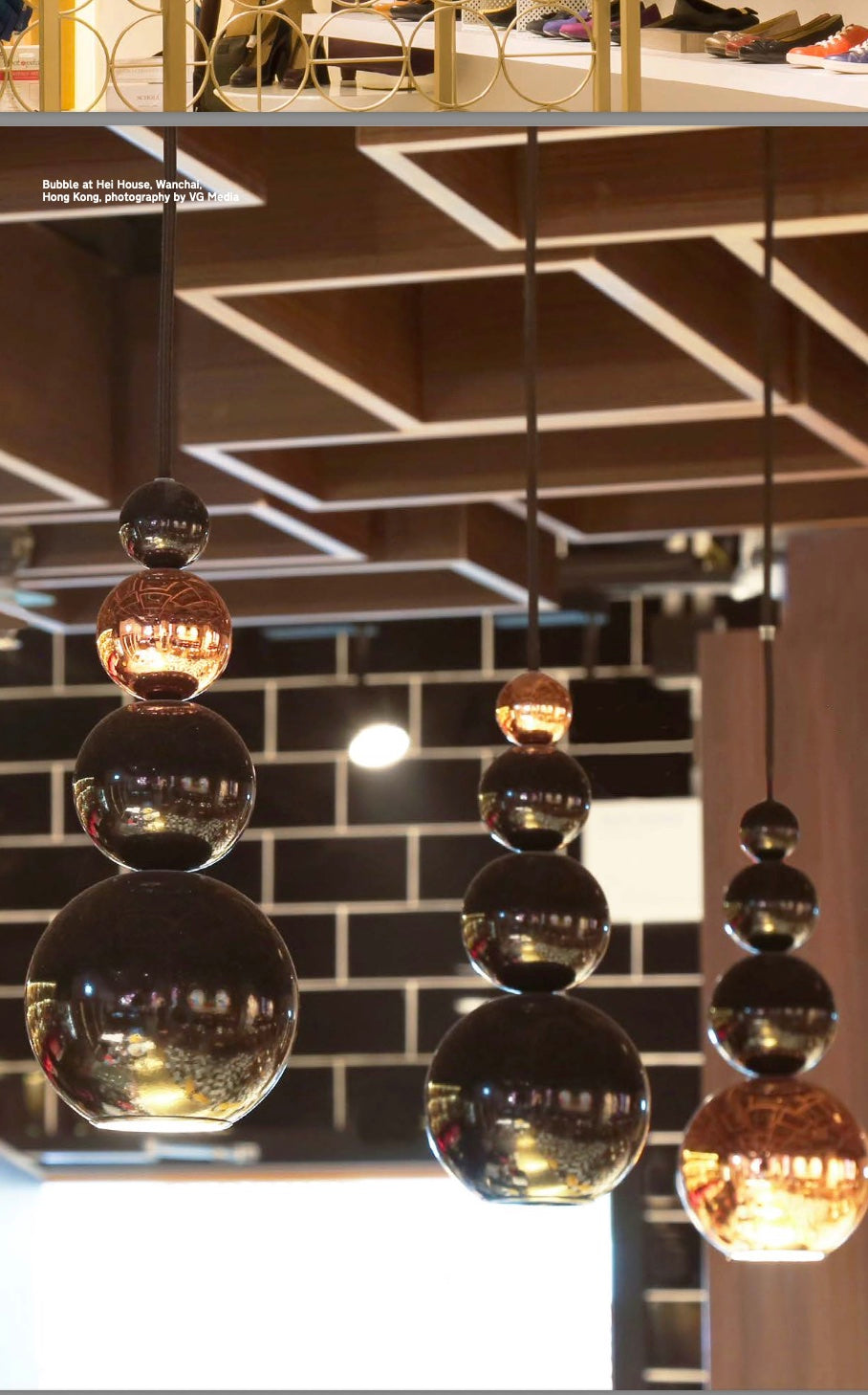 Designer bubble pendant light casting water-like shadows in modern living rooms