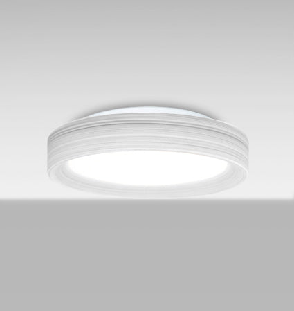 Besa Pella 13 Chalk glass lit from below, angled view