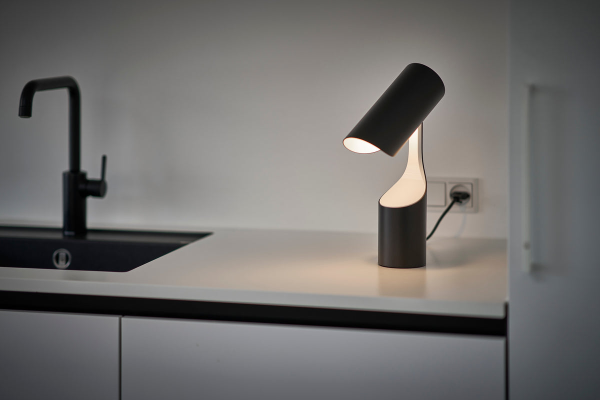 Mutatio Table Lamp styled in a room by Le Klint (3)