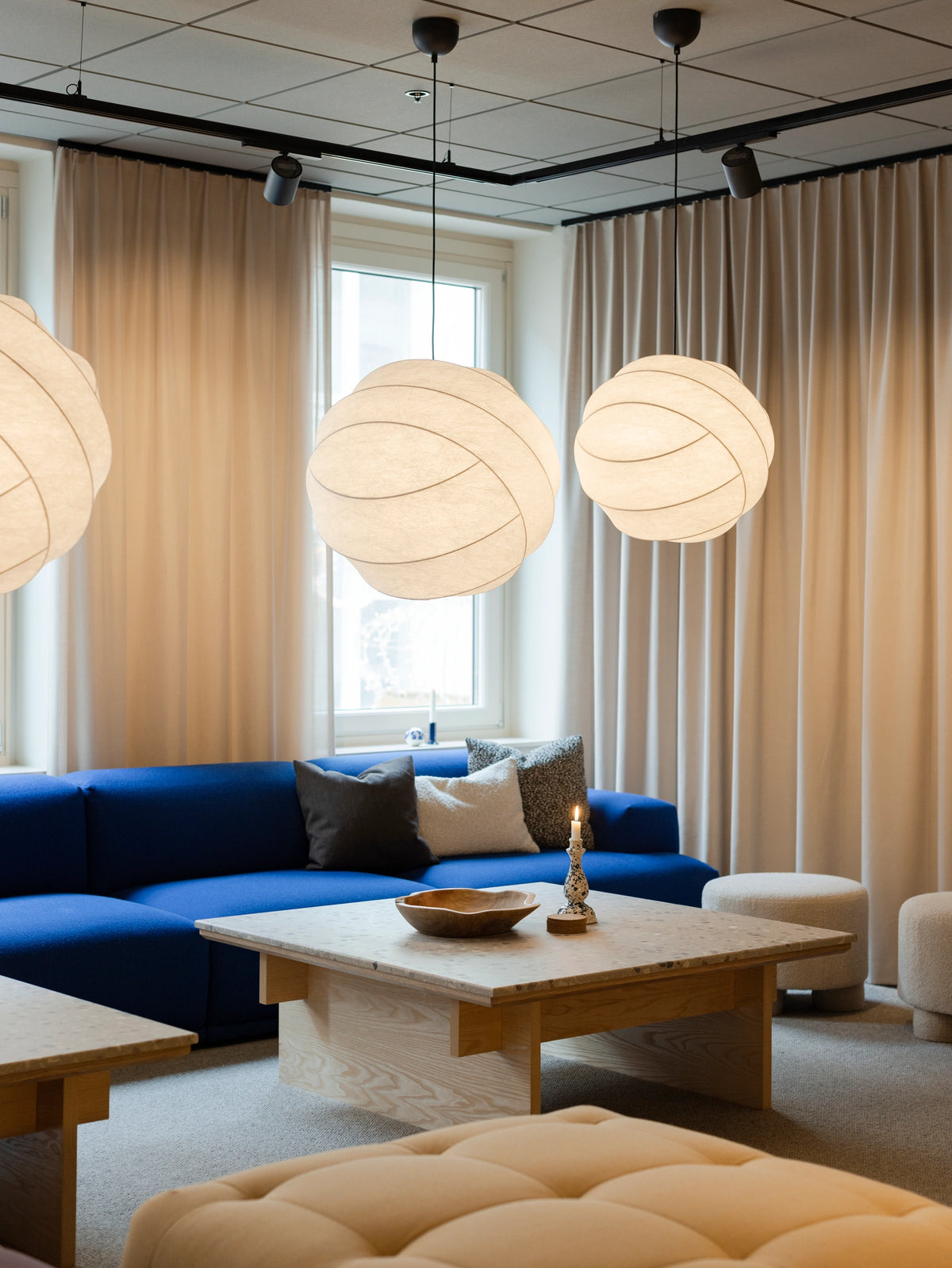 Pholc Turner cocoon pendant light by Broberg & Ridderstråle – Turner 65 and Turner 50 over a lounge