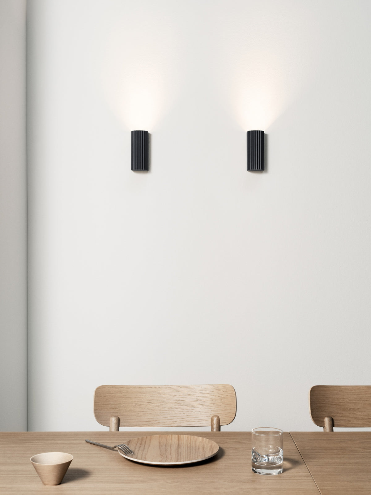 Pholc Donna wall light by Nina Jobs and Stina Sandwall – Black Ink, styled in a room (2)