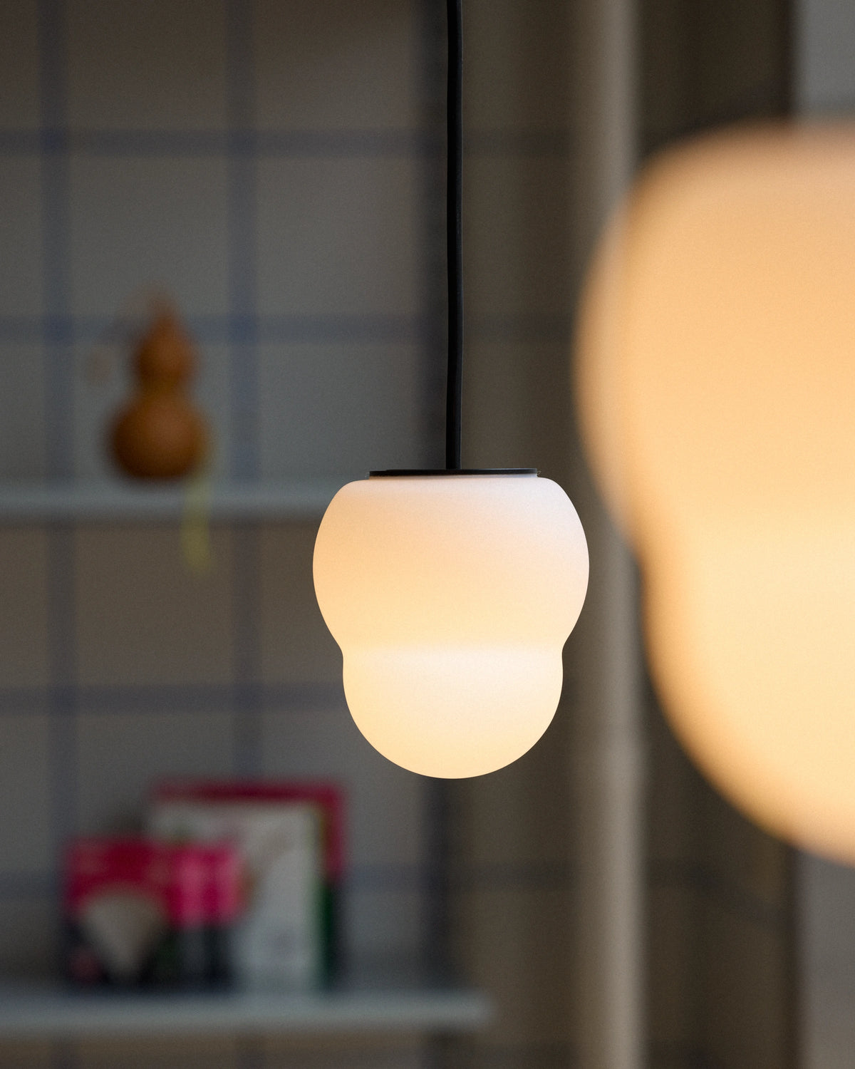 Pholc Fall opal glass pendant by John Astbury – Opal, styled in a room (4)