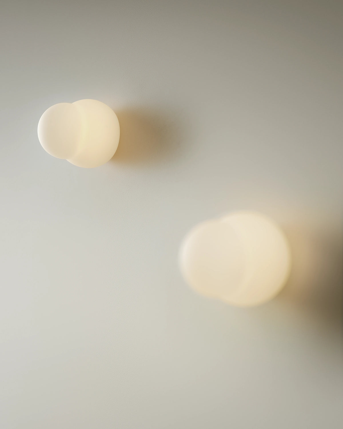 Pholc Fall opal glass wall light by John Astbury – Opal, studio view (3)