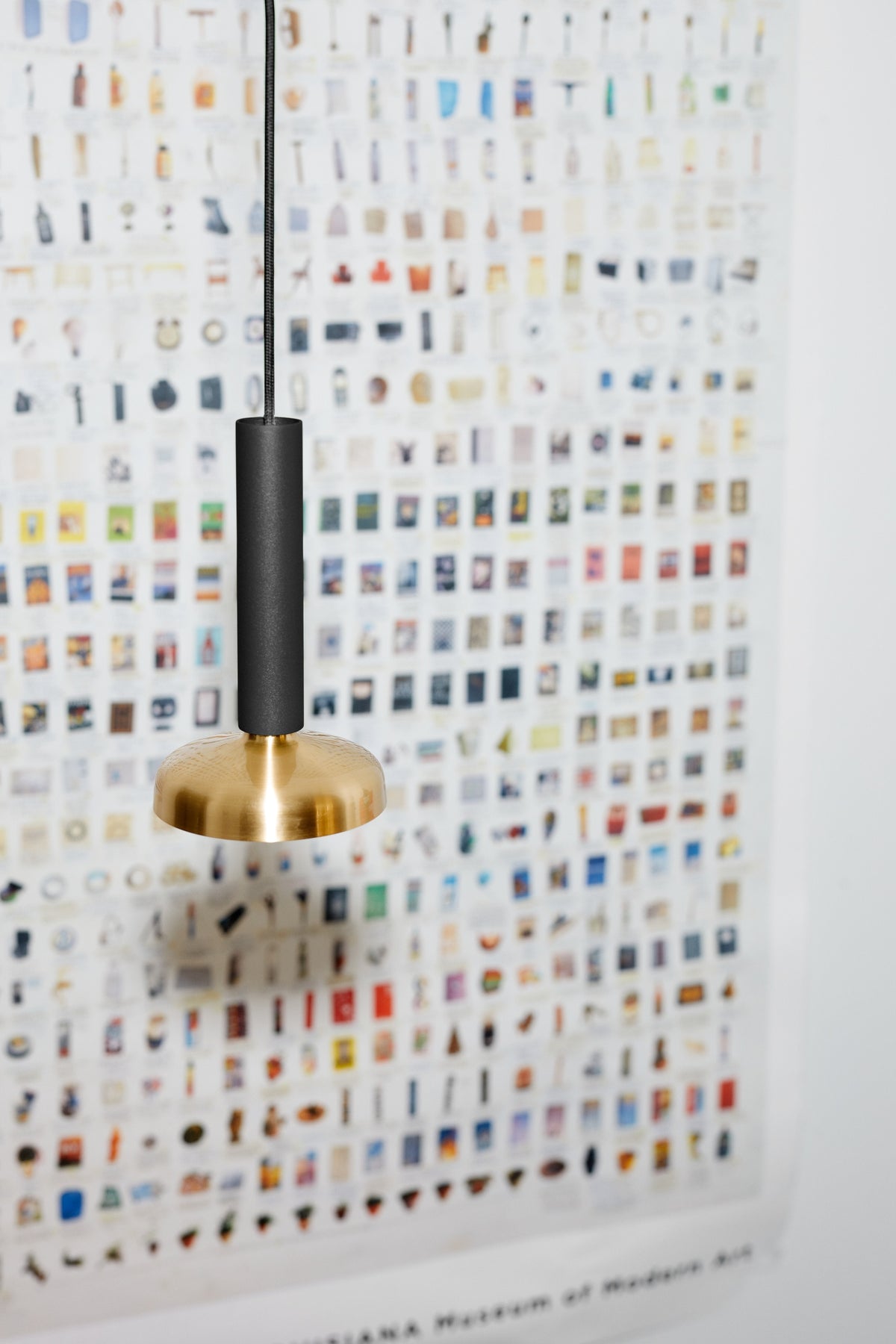 Pholc Blend mini pendant light by Sabina Grubbeson – Jet Black and Brass, styled in a room (2)