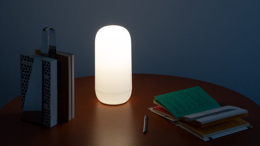 Artemide Gople Portable Table Lamp in a room setting