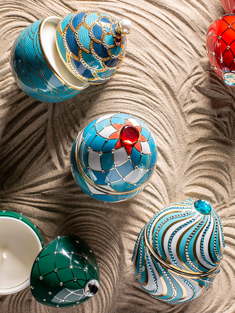 Bois de Russie 220 g ceramic egg candle by Ladenac Milano, Harlequin Blue egg styled with other decors