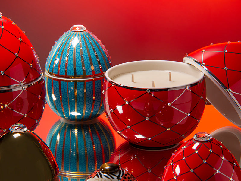 Bois de Russie 450 g ceramic egg candle by Ladenac Milano, Red Silver Stripes egg opened to show the candle