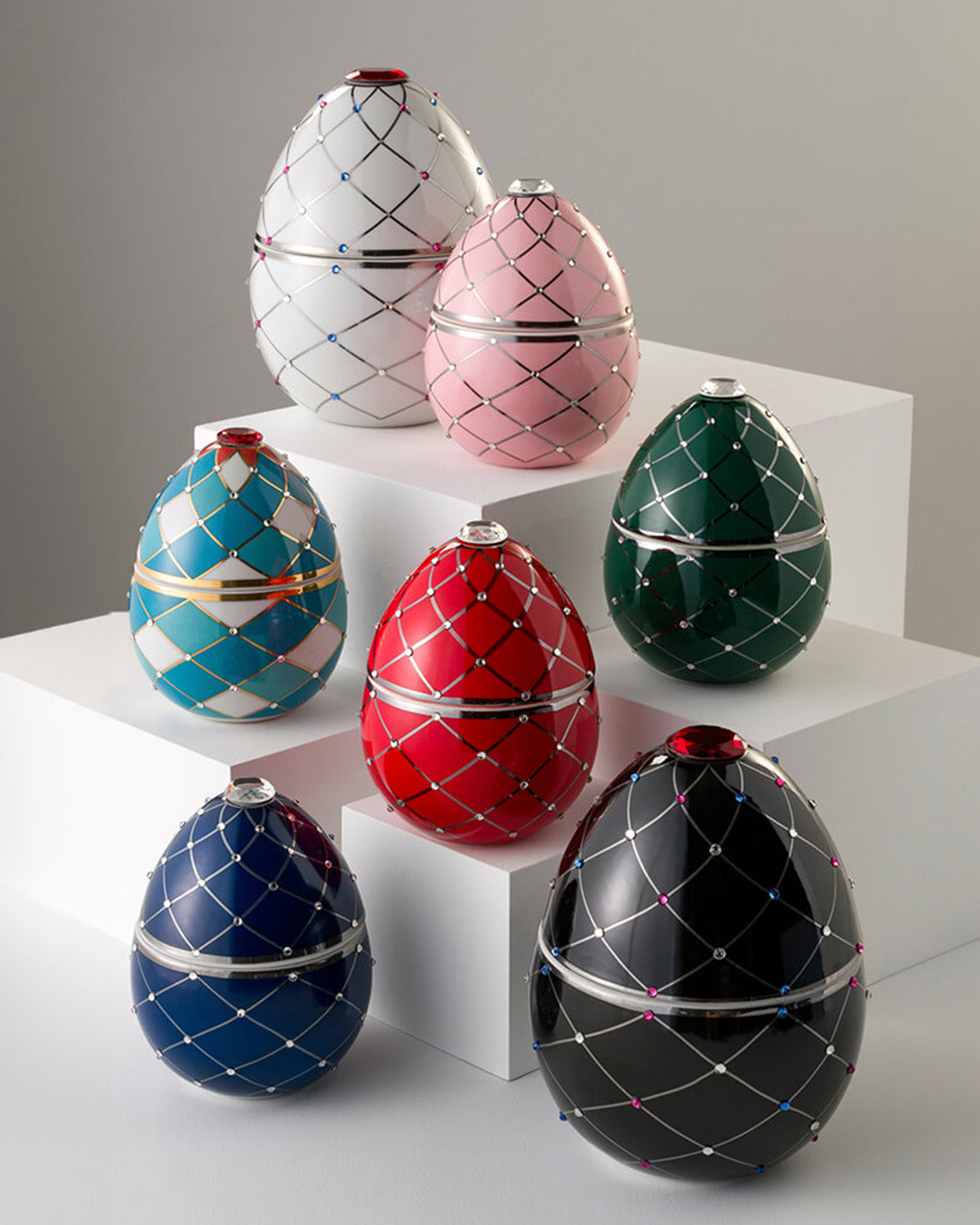 Bois de Russie 220 g ceramic egg candle by Ladenac Milano, a group of decorated eggs on a white table