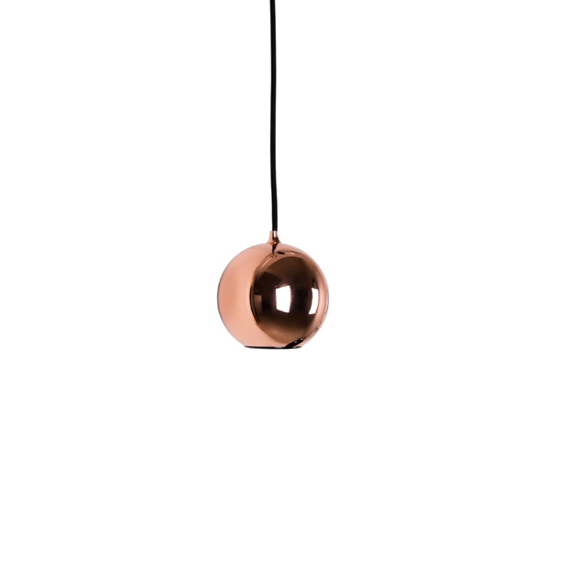 Copper Innermost Boule hanging fixture with braided cable, ideal dimmable accent lighting for kitchen island or dining area.