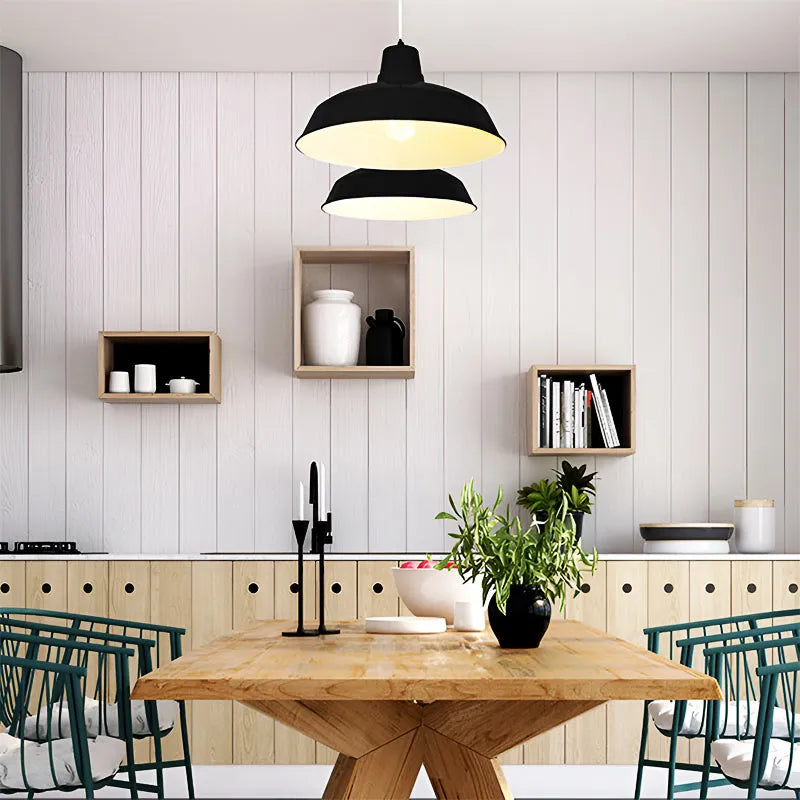 Series of Innermost Foundry 40 black pendants in a commercial hotel lobby