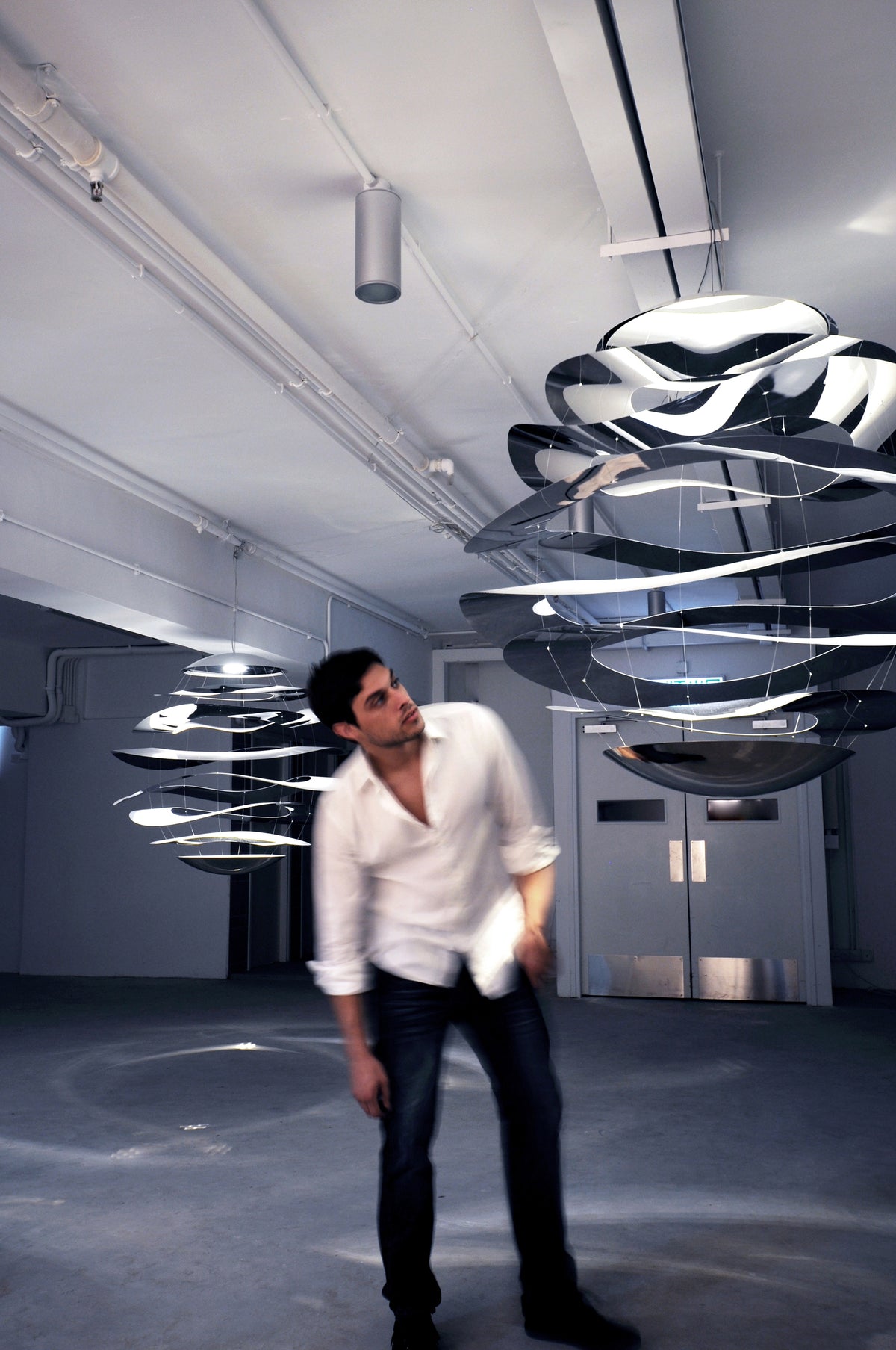Innermost Buckle 120 LED pendant by Tina Leung – installed in a lounge
