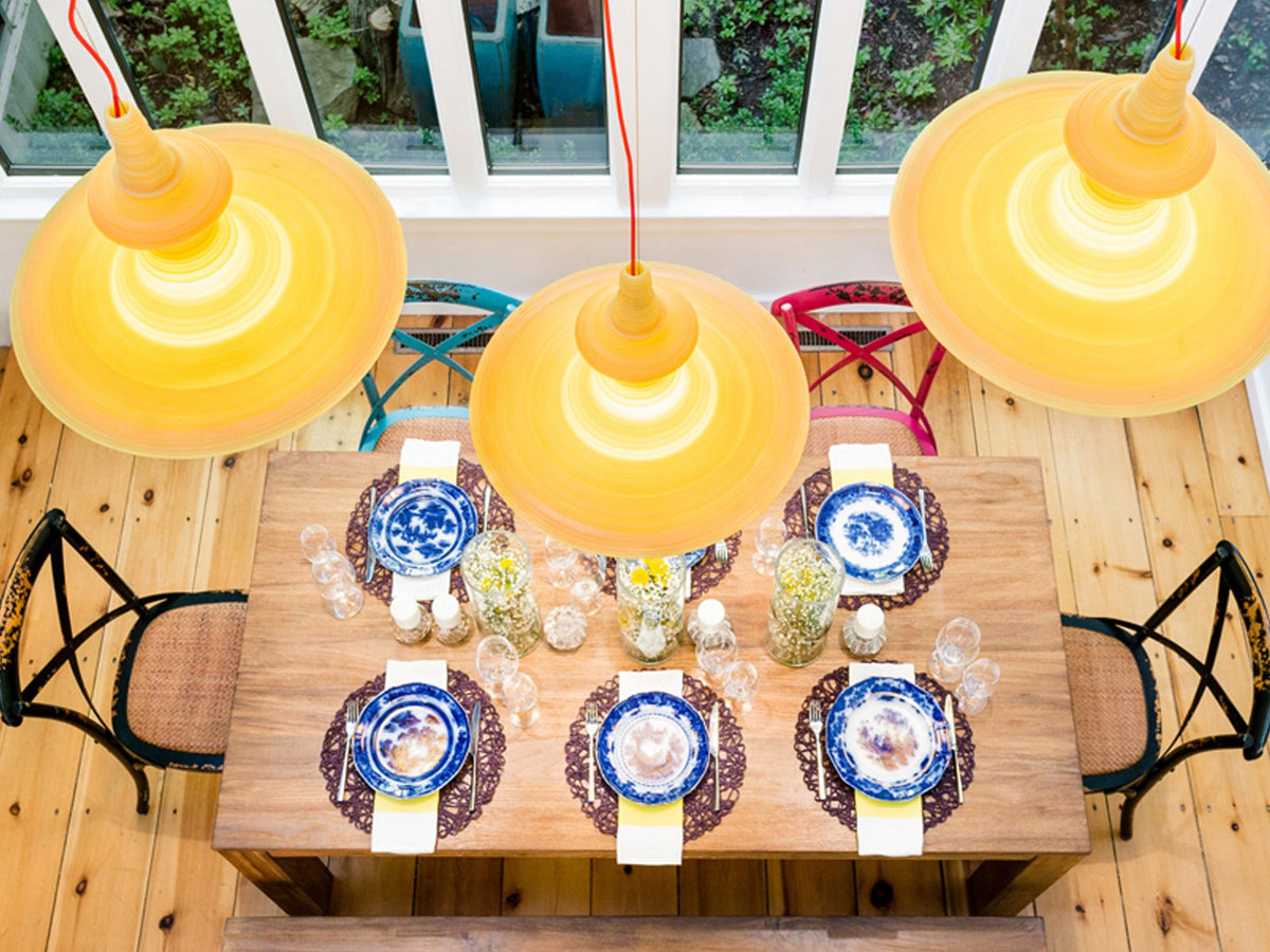 Innermost Stupa resin pendant light by Freshwest – Stupa 56 Yellow over a dining table