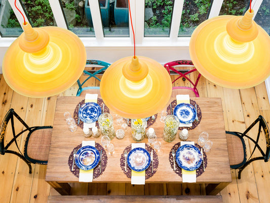 Innermost Stupa resin pendant light by Freshwest – Stupa 56 Yellow over a dining table