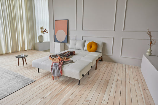 Innovation Living Cubed Full Sofa Bed with Dark Wood Legs in a furnished room, Mixed Dance Natural fabric – view 1