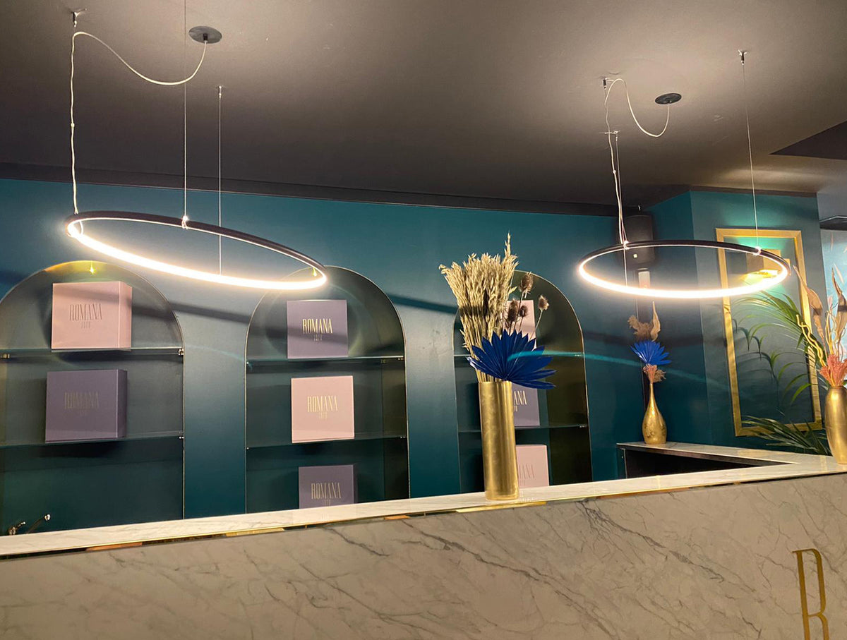 Egoluce Lancia Tonda led ring pendant in a room setting