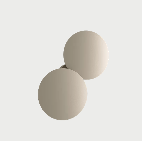 Contemporary Lodes Puzzle Round Double matte champagne indirect LED light mounted on a wall