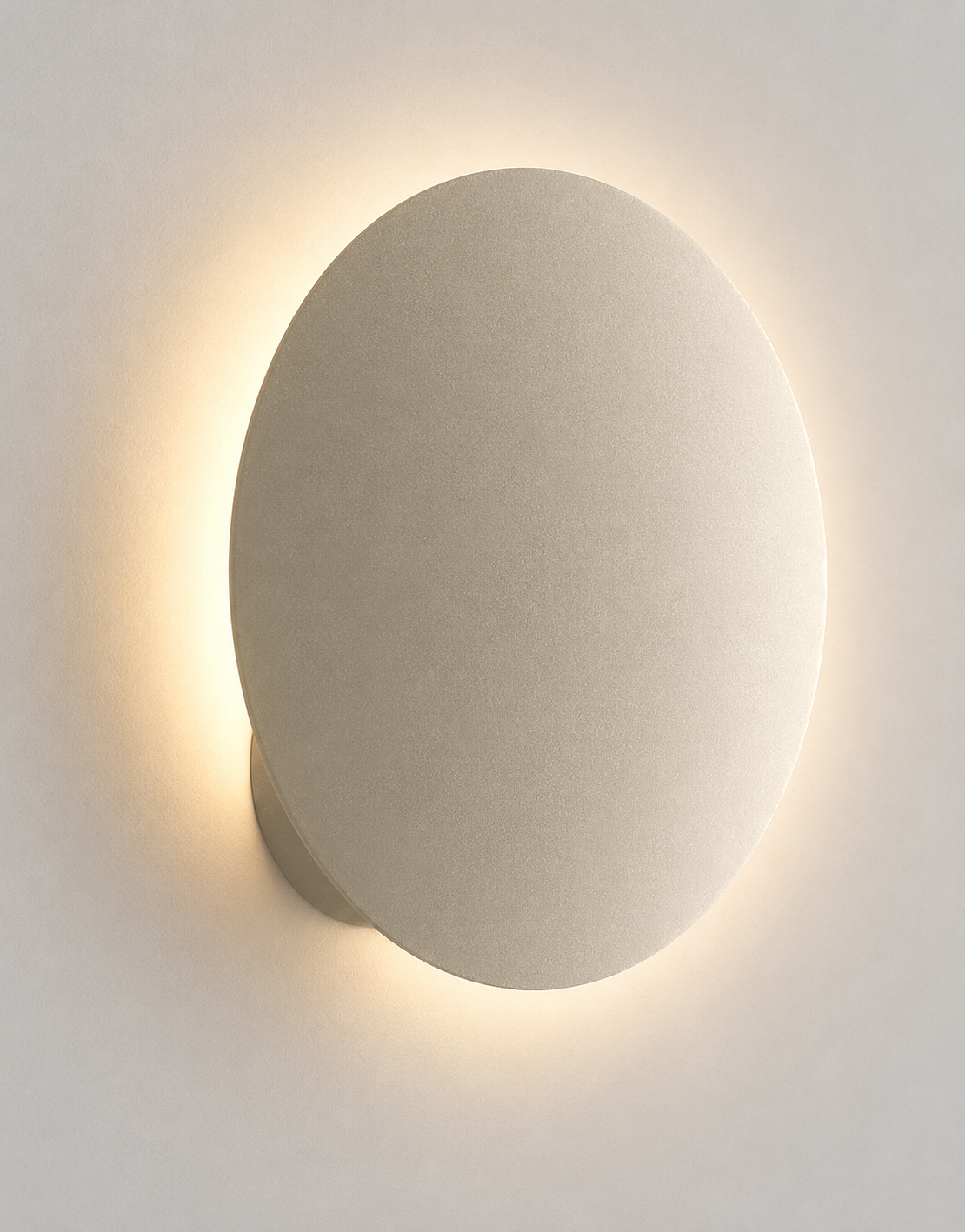 Lodes Puzzle Round Single matte champagne circular LED wall light with adjustable indirect lighting