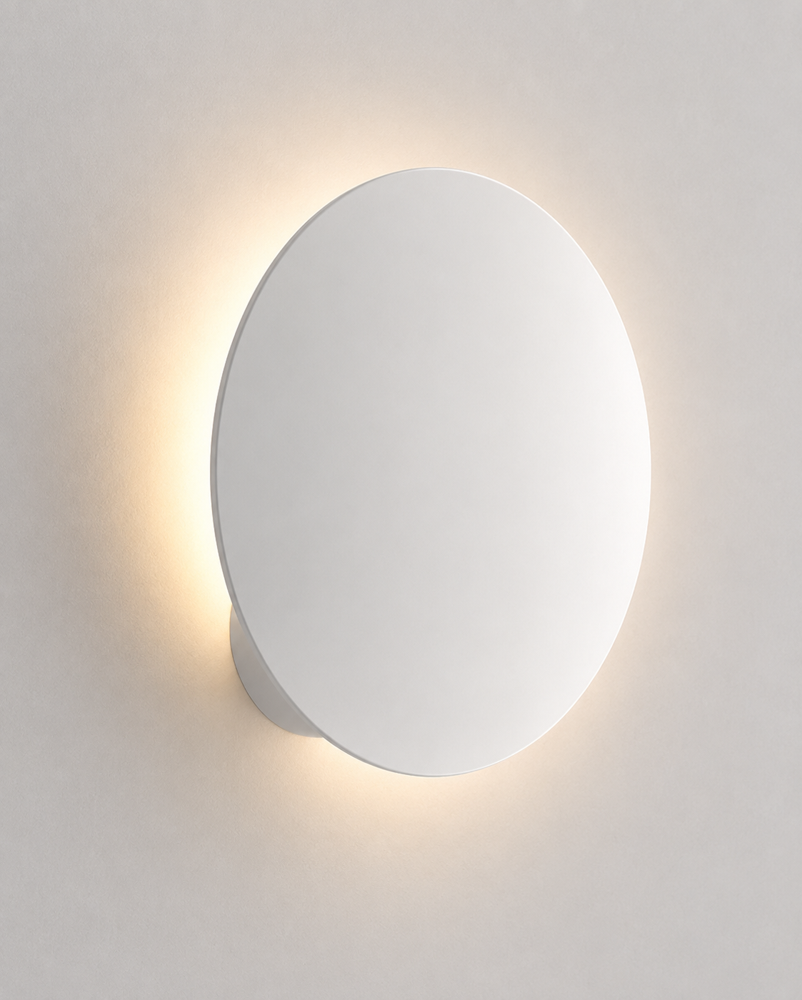 Lodes Puzzle Round Single LED Wall Light in Matte White Finish with minimalist circular design for modern interiors