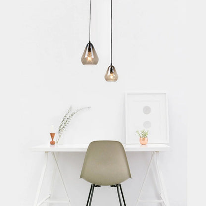 Ambient smoked glass ceiling light creating a cozy bedroom atmosphere.