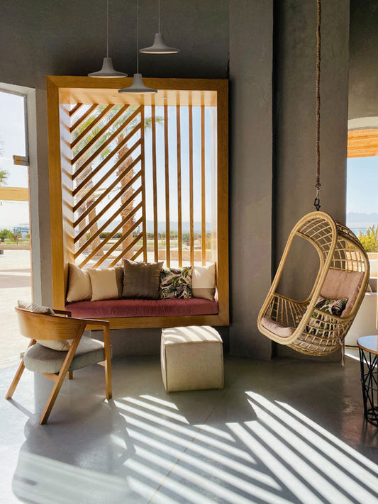 Besa Modus low-voltage pendants hanging in a bright lounge corner