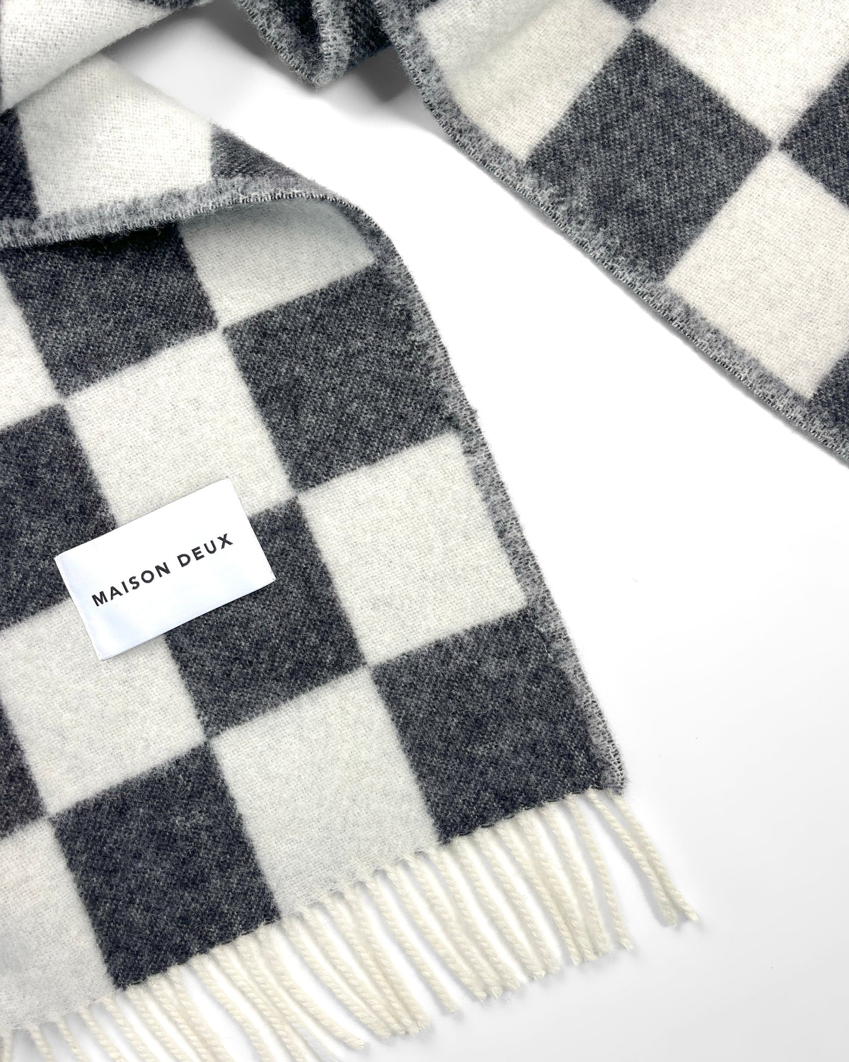 Maison Deux Checkerboard Wool Blanket in Black/White – detail 4
