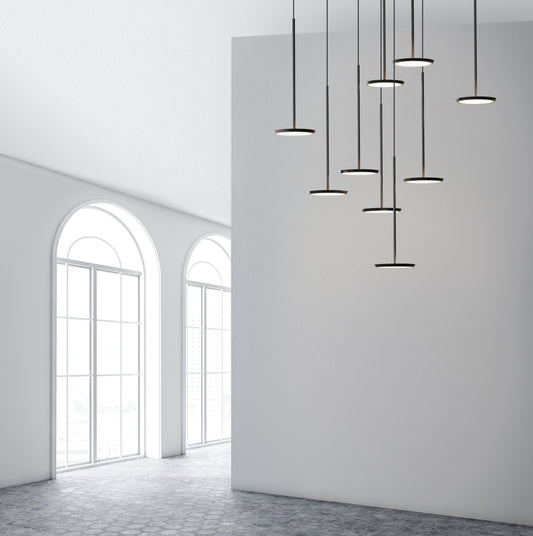 Pablo Designs Sky Solo Chandelier 5 shown in a furnished interior