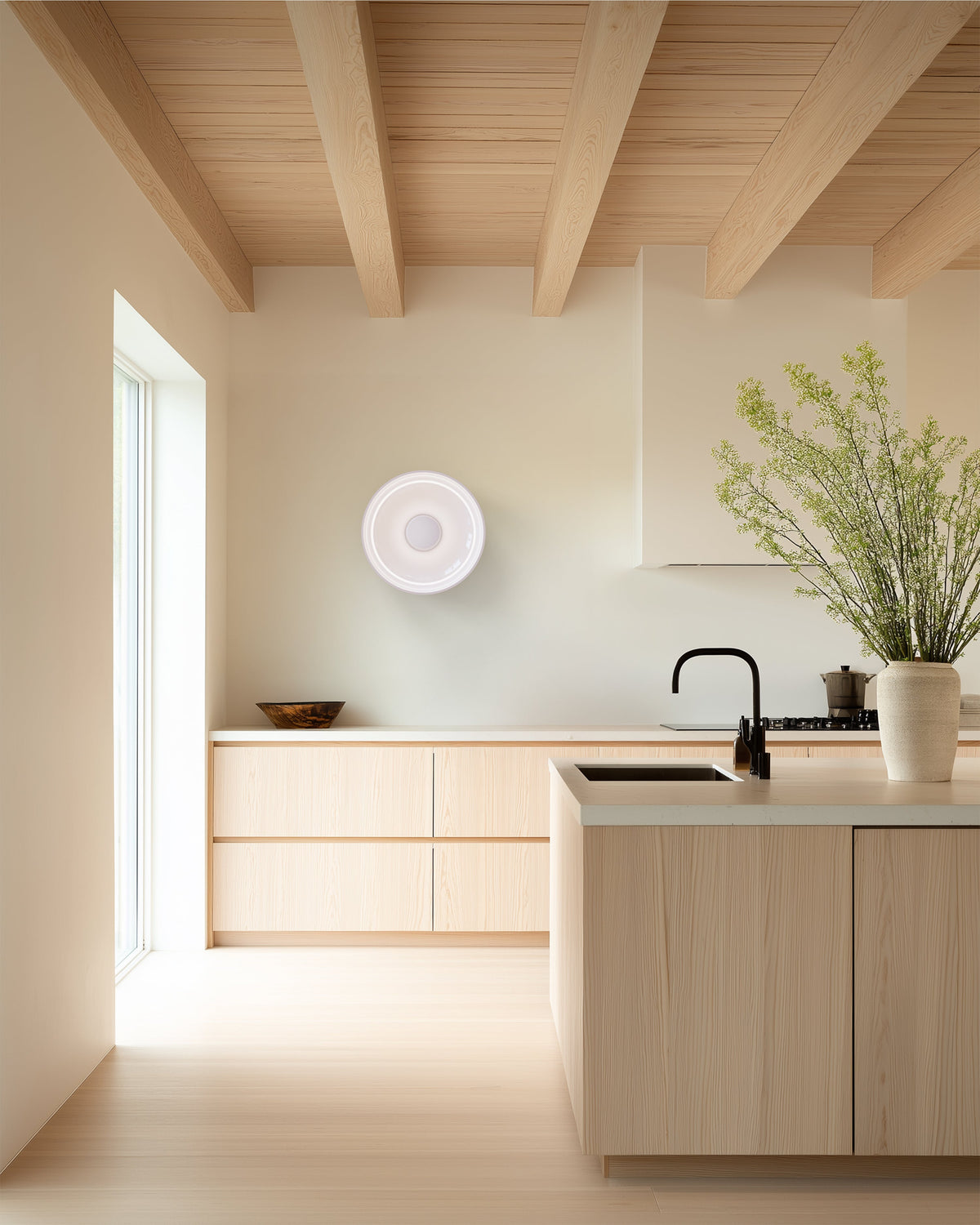 Pablo Designs Totem Sconce Glass C & D shown in a furnished interior