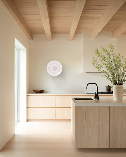 Pablo Designs Totem Sconce Glass C & D shown in a furnished interior