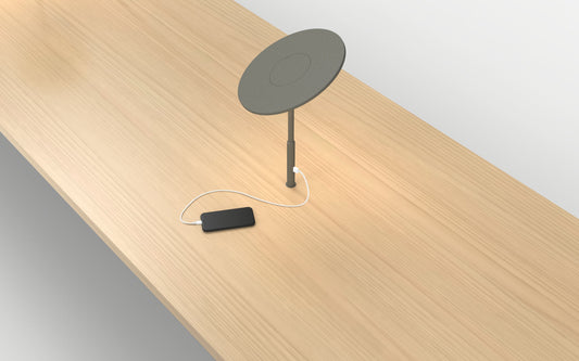 Pablo Designs Circa Grommet LED Desk Lamp shown in a furnished interior