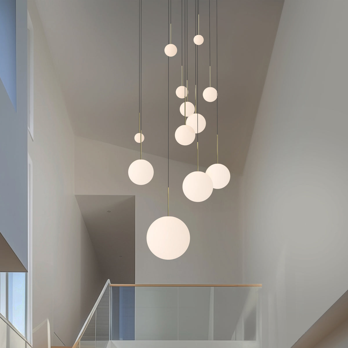 Pablo Designs Bola Sphere LED Chandelier shown in a furnished interior