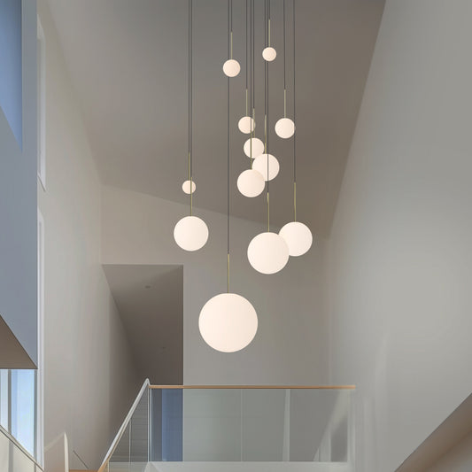 Pablo Designs Bola Sphere LED Chandelier shown in a furnished interior