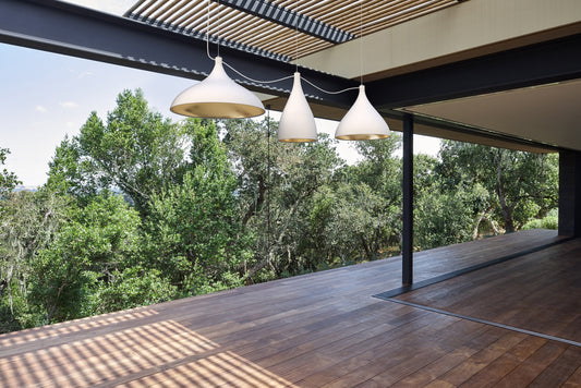 Pablo Designs Swell XL String Single Pendant shown in a furnished interior