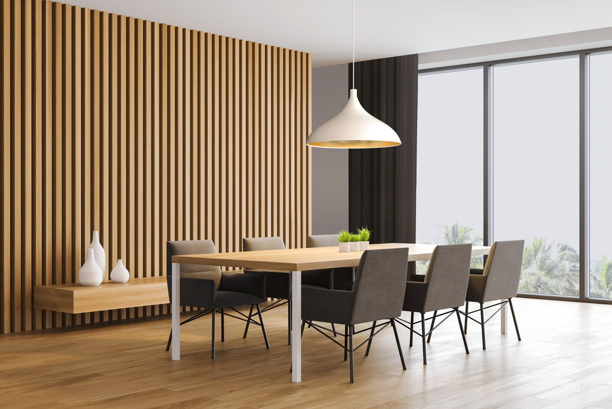 Pablo Designs Swell XL Single LED Pendant shown in a furnished interior