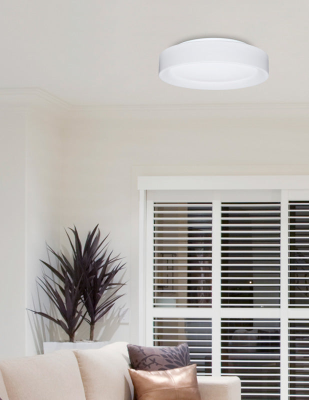 Besa Pella 13 opal flush mount over a bright living room