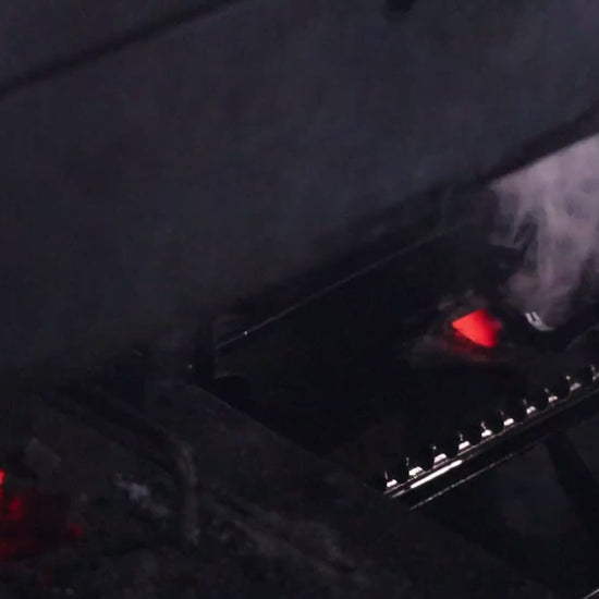 Tobisho forge close-up – steel heated in the charcoal fire before hammering