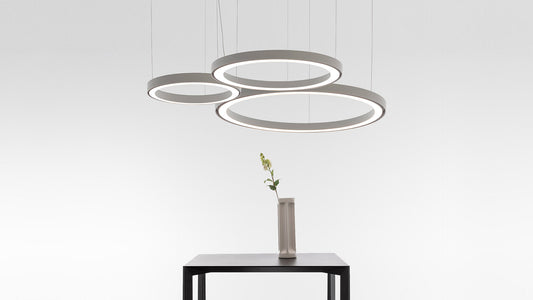 Artemide Ripple 70 Pendant Diffuser 23.5" Tall in a room setting
