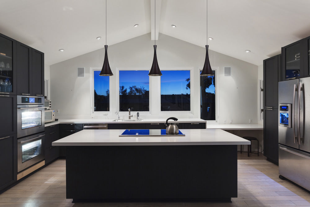 Besa Rondo, rondo pendants over a kitchen island