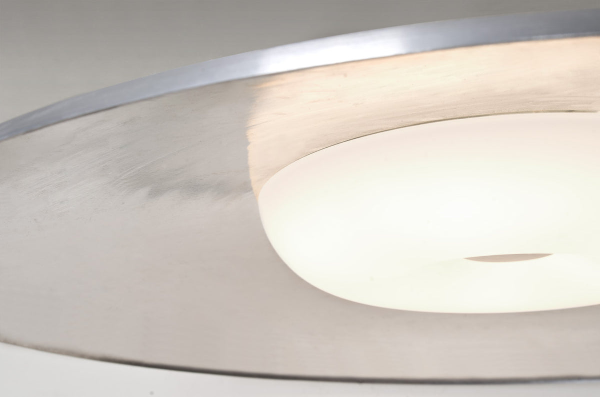 Besa Swan disc pendant on a cable: close view of the opal diffuser and shade edge