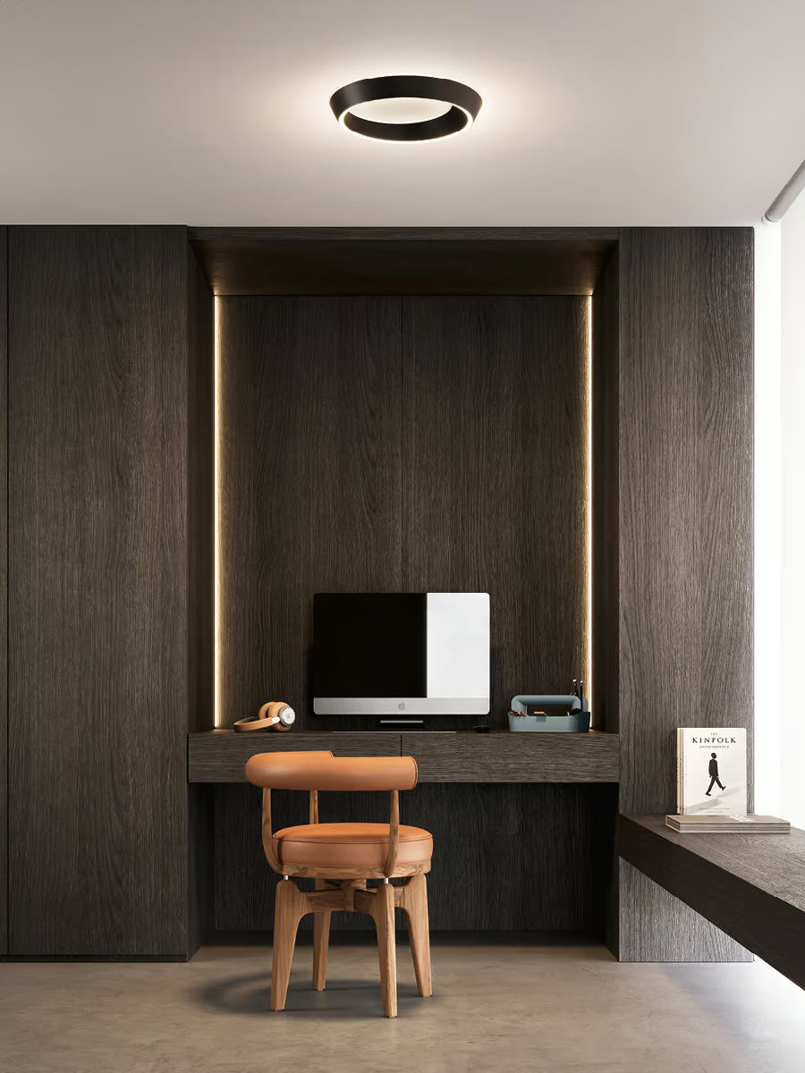 Minimalist Lodes Tidal matte black ceiling fixture with upward and downward LED lighting