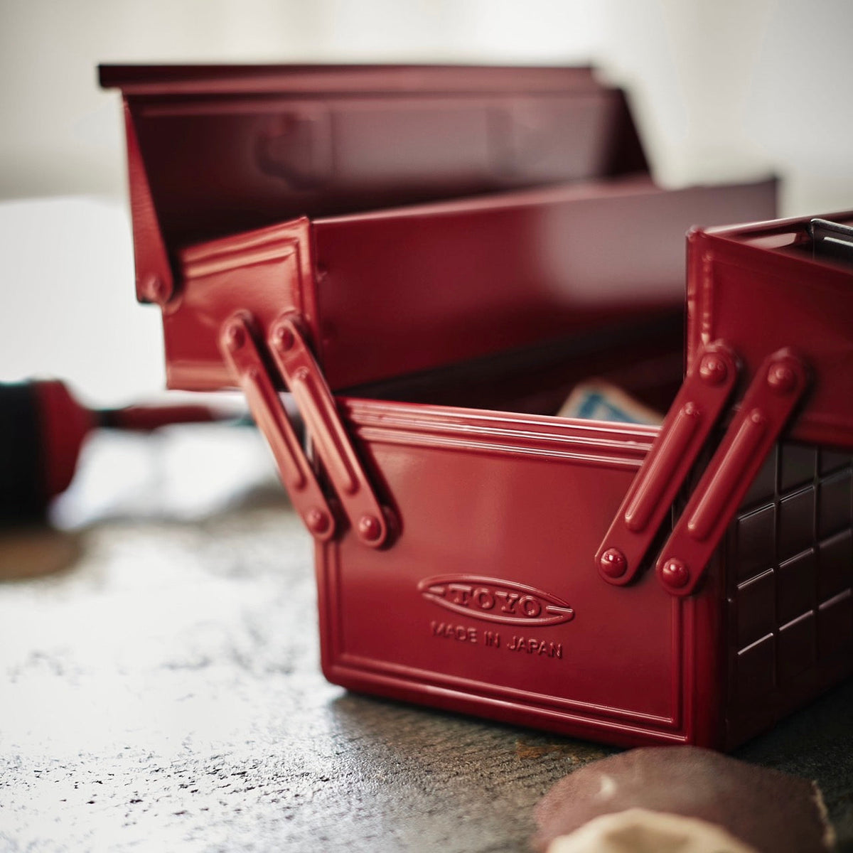 Toyo Steel ST-350 Two-Level Cantilever Toolbox – Red in use