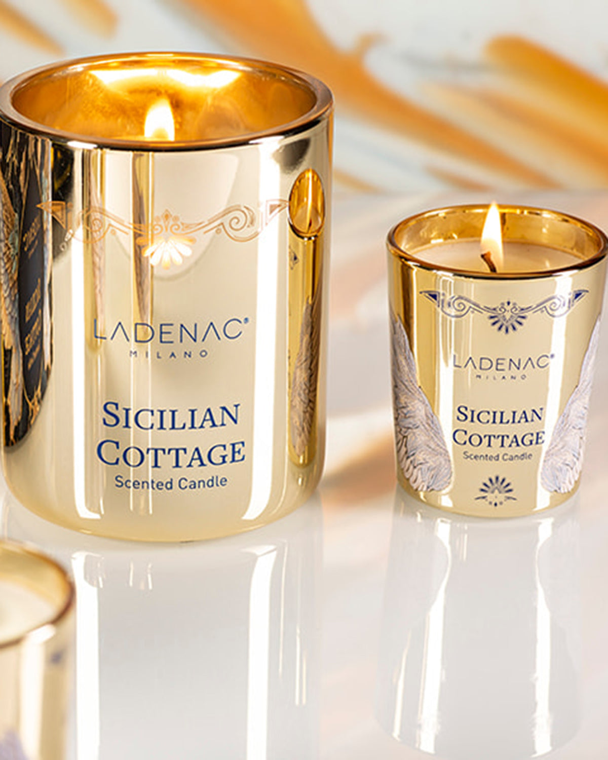 Sicilian Cottage 75 g carousel candle by Ladenac Milano, gold candles grouped together