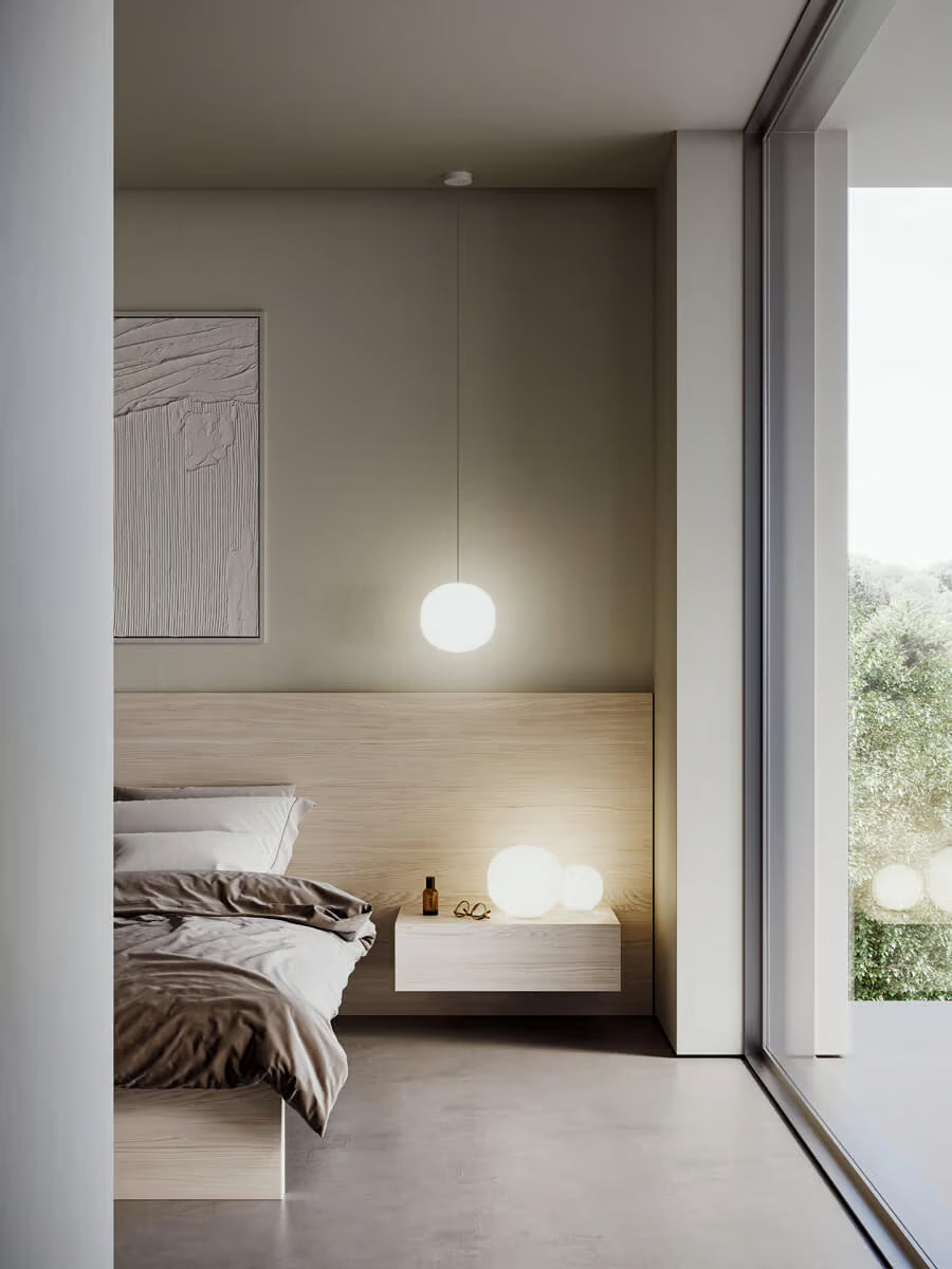 Lodes Volum modern bedside lamp with glossy blown glass shade