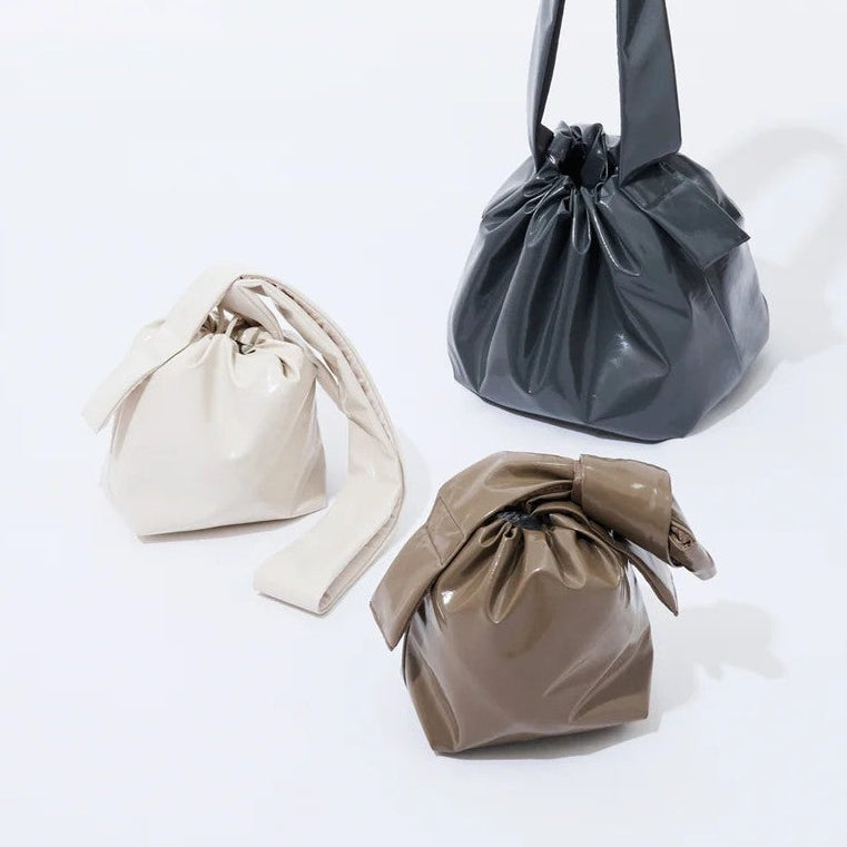 Tekateka bags in white, charcoal and mocha together