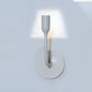 Innermost YOY wall light projecting lampshade illusion on modern white wall.